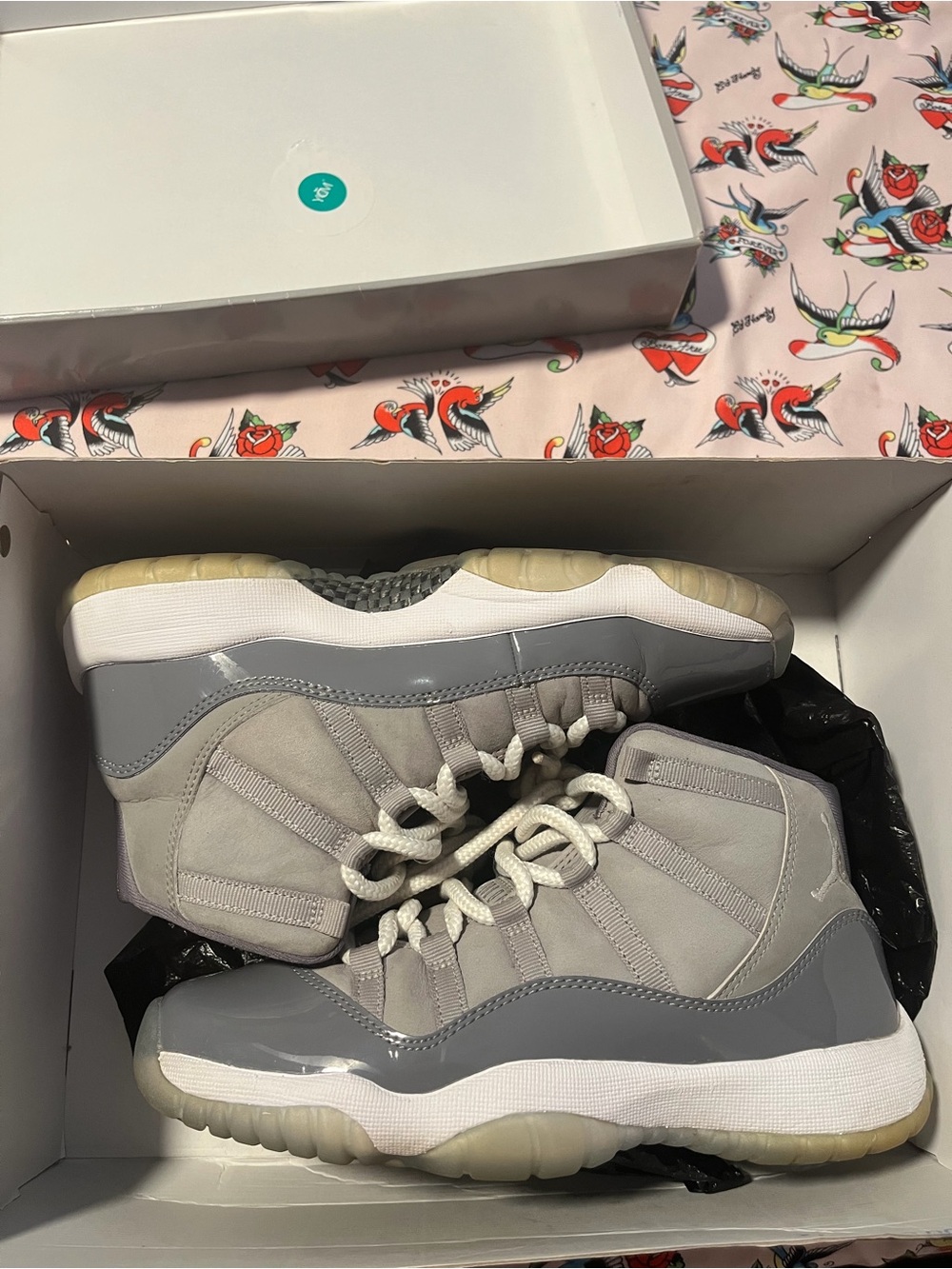 Jordan Women's Retro 11 Sneakers in Grey and White